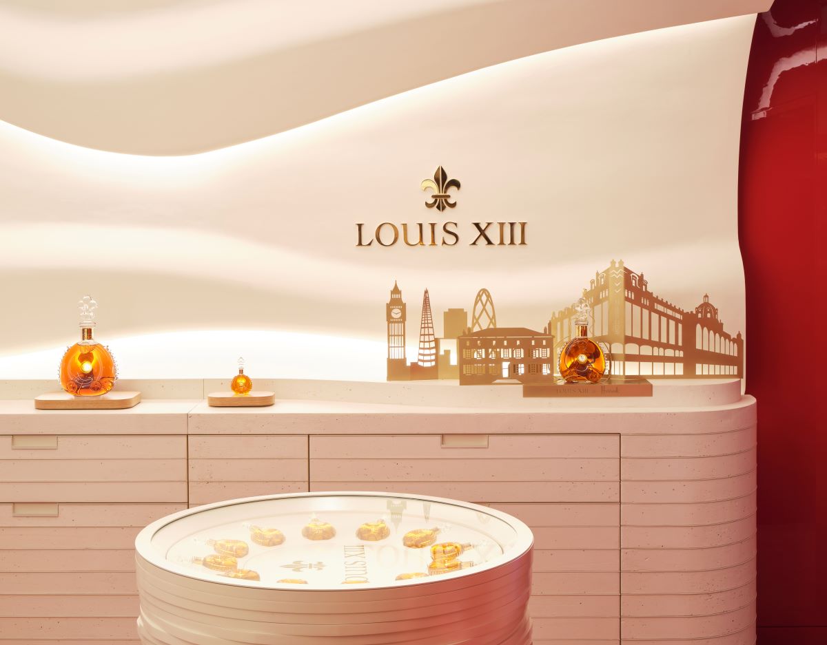 A photo of the Harrods boutique in London, with LOUIS XIII decanter on the display