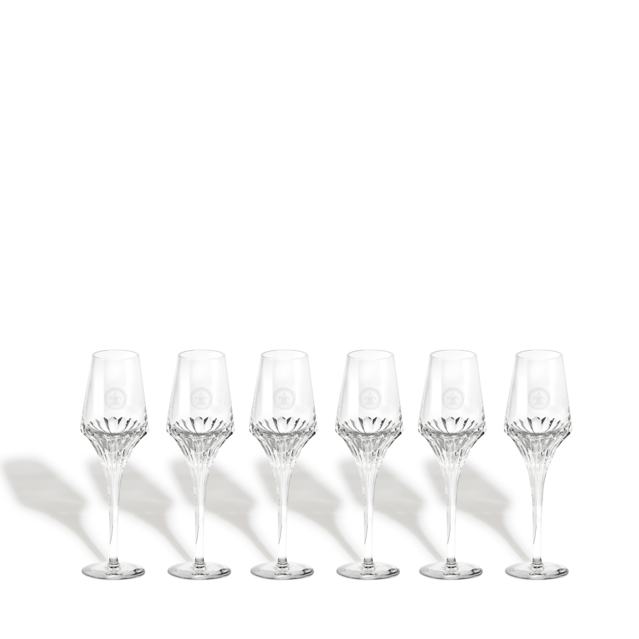 A packstot of six LOUIS XIII crystal glasses on a white background