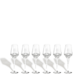 A packstot of six LOUIS XIII crystal glasses on a white background